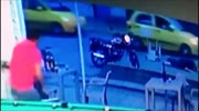 Robber opens fire killing one and injuring another resisting victim