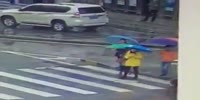Rainy day purse snatching