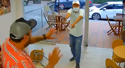 Colombian Cafeteria Robber Freaking Out