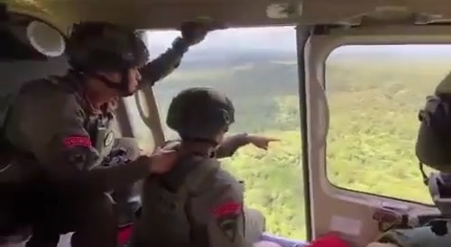 Aerial firing by Indonesian Police