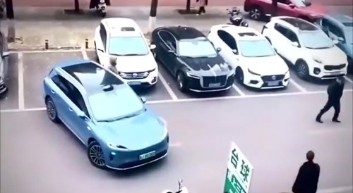 A woman tried blocking a parking spot