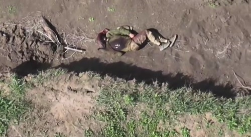 Dropping grenades on Ukrainians