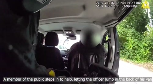 Van driver gives armed officer chasing a suspect a ride